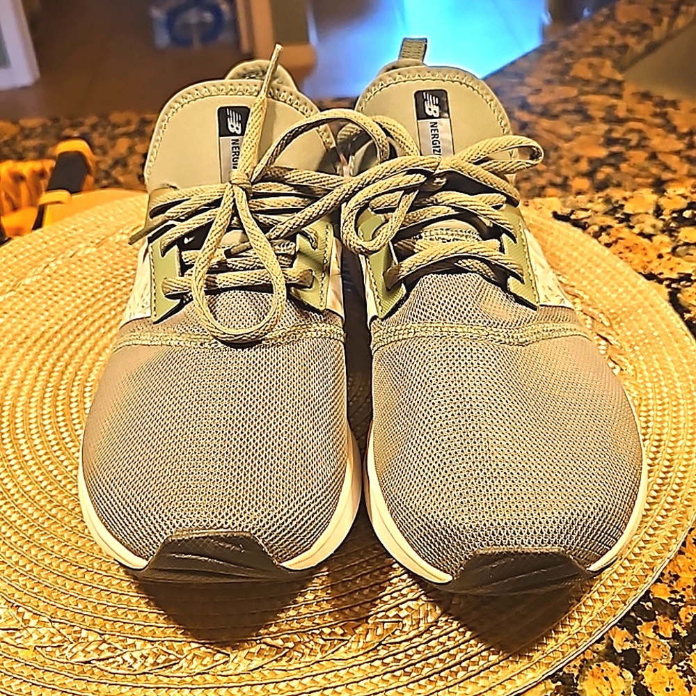 Women New Balance sneakers 9.5 army green.